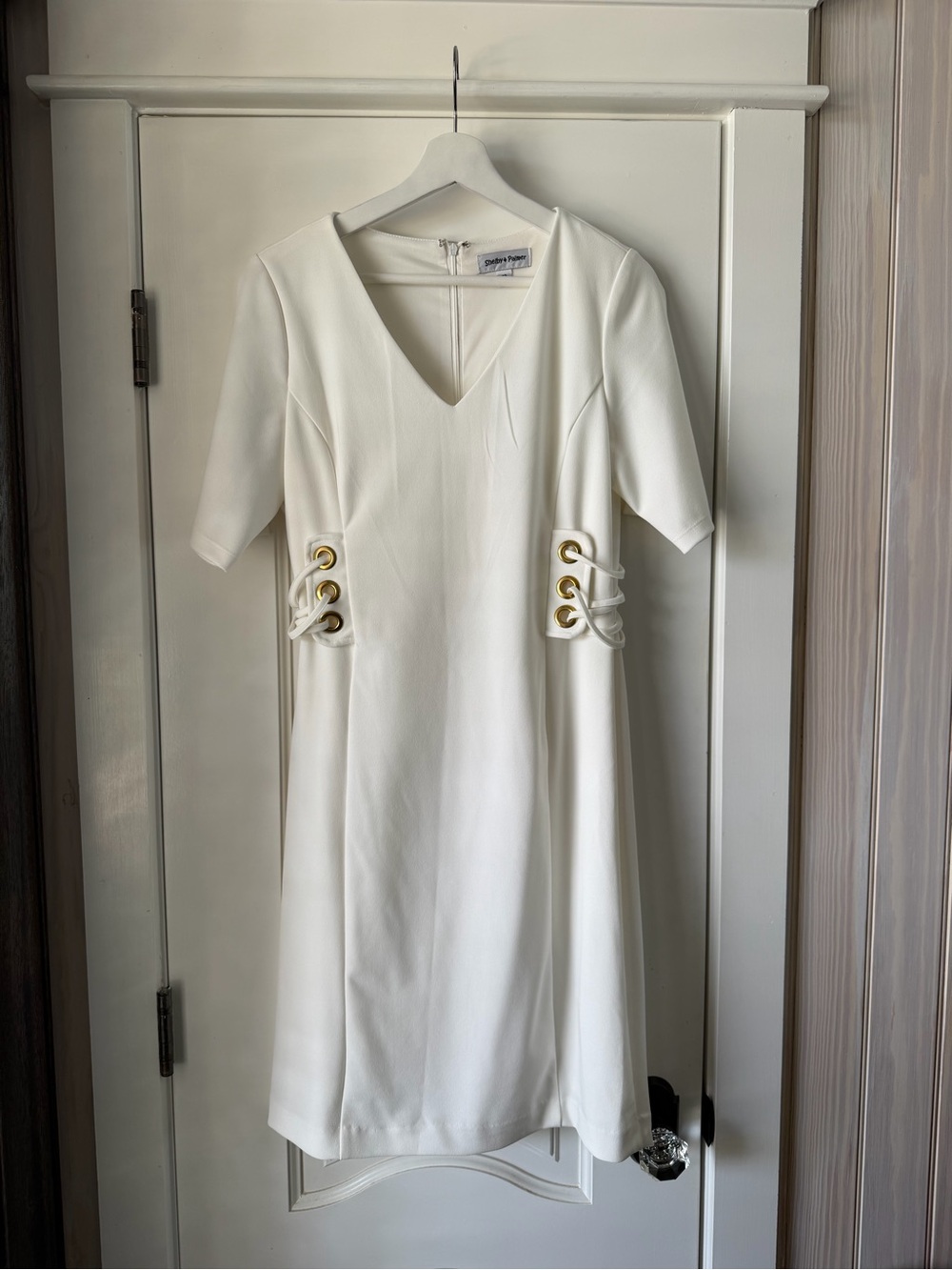 Shelby & Palmer White V-Neck Midi Dress with Gold Accents
